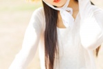 Beautiful and fresh outdoor photo of girl wearing straw hat