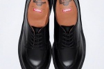 Supreme and Martin boots joint series shoe display