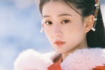 Qiao Xin's beautiful costume photo in the snow