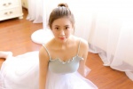 Beautiful and moving photo of dance teacher in suspender gauze skirt