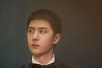 Wang Yibo's elegant and handsome photo in white shirt and black suit