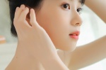 Beautiful lady in white silk stockings sexy dance costume art photo