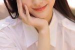 Beautiful girl in pure student outfit mobile wallpaper