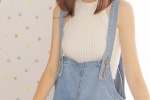 Aesthetic photo of a sunny and cute girl wearing suspenders and overalls