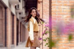 Photos of Li Qin's elegant temperament on the streets in early winter
