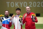 Zhang Changhong shoots men's 50m rifle three-position gold medal