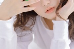 Beautiful and sexy artistic photo of a girl with wool curly hair
