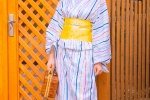 Beautiful girl in Japanese kimono, white and sexy street photo