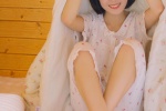 Short-haired beauty in pajamas, white and tender, sexy private room photo