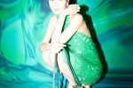 Liu Wen sexy bare back photo in green halter neck dress