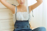 Sexy photo of a beautiful girl with round head and exposed shoulders
