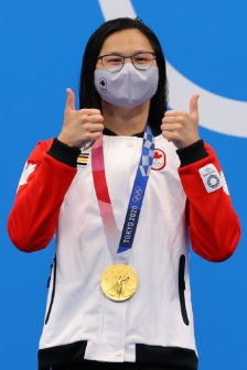 Chinese Canadian swimmer wins 100m butterfly