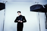 Photo of Xiao Shunyao, an elegant gentleman in black suit