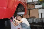 Sydney girl repairing car HD photos