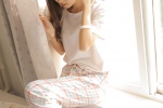 Beautiful girl in pajamas and pants, playful private photos