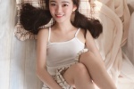 Beautiful girl in amusement park, sexy girl in miniskirt and uniform