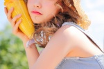 Summer outdoor photos of beauties in straw hats and low-cut legs