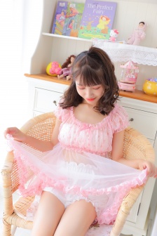 Sexy photo of beautiful model with red lips and slender legs