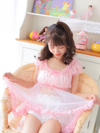 Sexy photo of beautiful model with red lips and slender legs