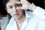 Zhang Zhehan handsome photo picture with relief flowers in white shirt