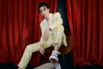Wang Junkai handsome photo in yellow printed suit