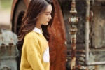 Photos of Li Qin's elegant temperament on the streets in early winter