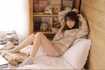 Literary girl's sultry long-legged charming photo