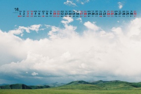 July 2021 blue sky and white clouds desktop calendar wallpaper