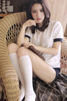 Long-legged beauty in sportswear mobile wallpaper