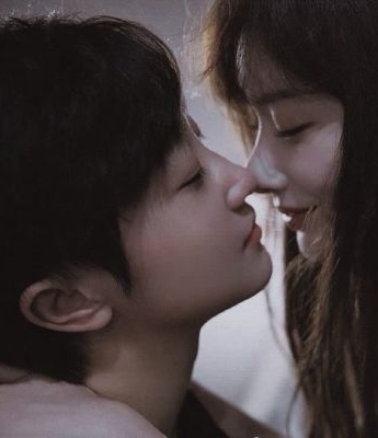 A very warm and sweet portrait of a couple in warm winter