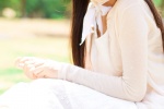 Beautiful and fresh outdoor photo of girl wearing straw hat