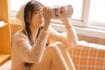 Warm and sexy photo of top beauty Lolita with long legs in white stockings
