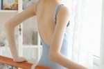 Beautiful lady in white silk stockings sexy dance costume art photo
