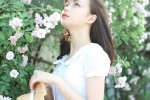 夏季草帽美女唯美花海写真图片