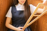 Seductive photo of beautiful girl in uniform in classroom
