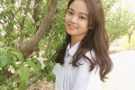 Beautiful girl in amusement park, sexy girl in miniskirt and uniform