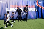 Messi shows off Paris team's new jersey photos