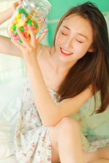 Beautiful girl in elegant floral skirt mobile wallpaper