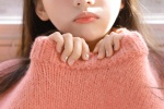 Beautiful girl in pink sweater mobile wallpaper