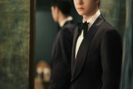 Wang Yibo's elegant and handsome photo in white shirt and black suit