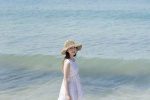 Summer seaside straw hat beauty mobile wallpaper