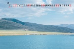 July 2021 mountains and lakes scenery desktop calendar wallpaper