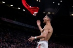 Cristiano Ronaldo strips off and shows off his muscles to celebrate after scoring a goal, very clear and beautiful pictures