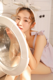 Photo of beautiful woman with fair skin and sexy suspender belt in bathroom