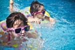Children playing in swimming pool material picture wallpaper