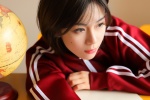 Sexy classroom photo of short-haired beauty in red sportswear