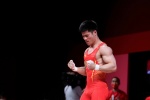 Li Fabin wins gold medal in men's 61kg weightlifting class