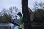 Romantic and sexy photos of Wan Qian walking in the rain in the forest