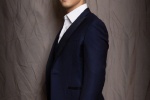 William Chan handsome photo of gentleman in dark blue suit