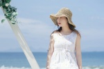 Summer seaside straw hat beauty mobile wallpaper